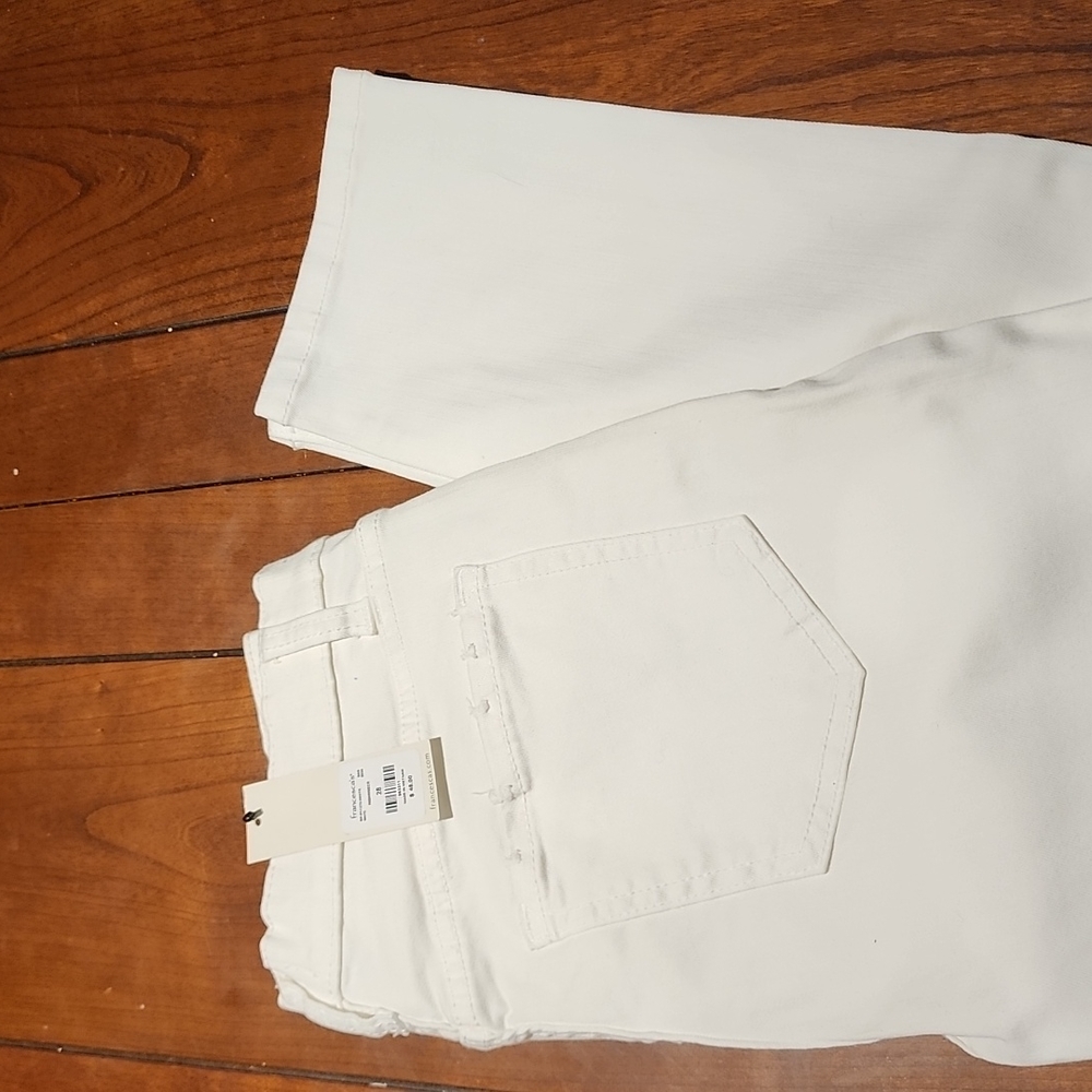 Spring/Summer jeans - Francesca'a Midrise Skinny white distressed stretch jeans
